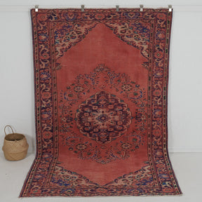 Handmade 6x10 area rug in red, ideal for a cozy living room, bedroom, office, entryway, kitchen