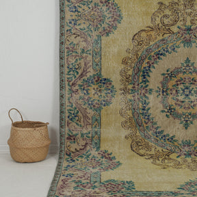 Authentic 7x10 area rug from turkish, in subtle yellow tones