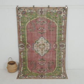 Handmade 5x8 area rug in red, ideal for a cozy living room, bedroom, dining room, office