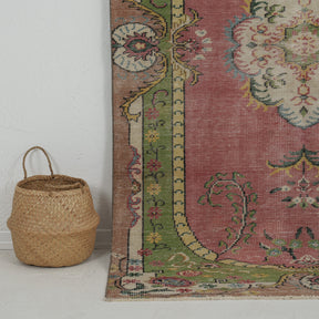 Authentic 5x8 area rug from turkish, in subtle red tones