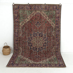 Handmade 6x10 area rug in red, ideal for a cozy living room, bedroom, dining room, office, entryway