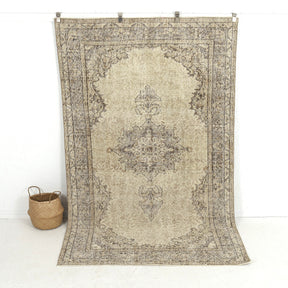 Handmade 5x9 area rug in beige, ideal for a cozy living room, bedroom, entryway, office, kitchen & dining