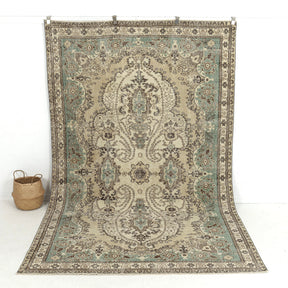 Handmade 7x10 area rug in beige, ideal for a cozy living room, bedroom, entryway, office, kitchen & dining