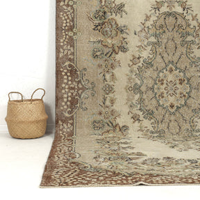 Authentic 6x11 area rug from turkish, in subtle beige tones