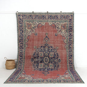 Handmade 7x11 area rug in red, ideal for a cozy living room, bedroom, entryway, office, kitchen & dining