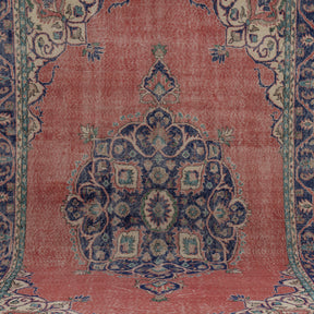 Authentic 7x11 area rug from turkish, in subtle red tones