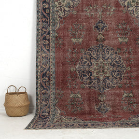 Authentic 6x9 area rug from turkish, in subtle red tones