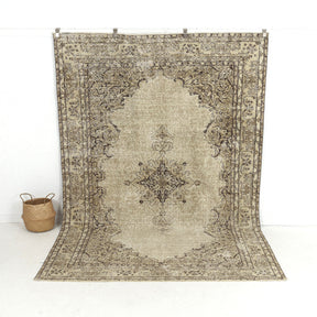 Handmade 7x10 area rug in beige, ideal for a cozy living room, bedroom, entryway, office, kitchen & dining