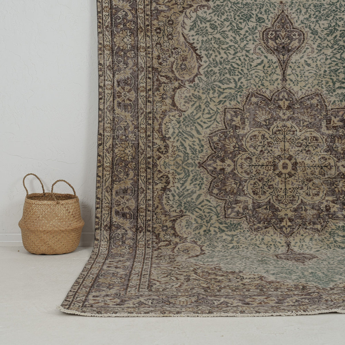 Authentic 7x10 area rug from turkish, in subtle green tones