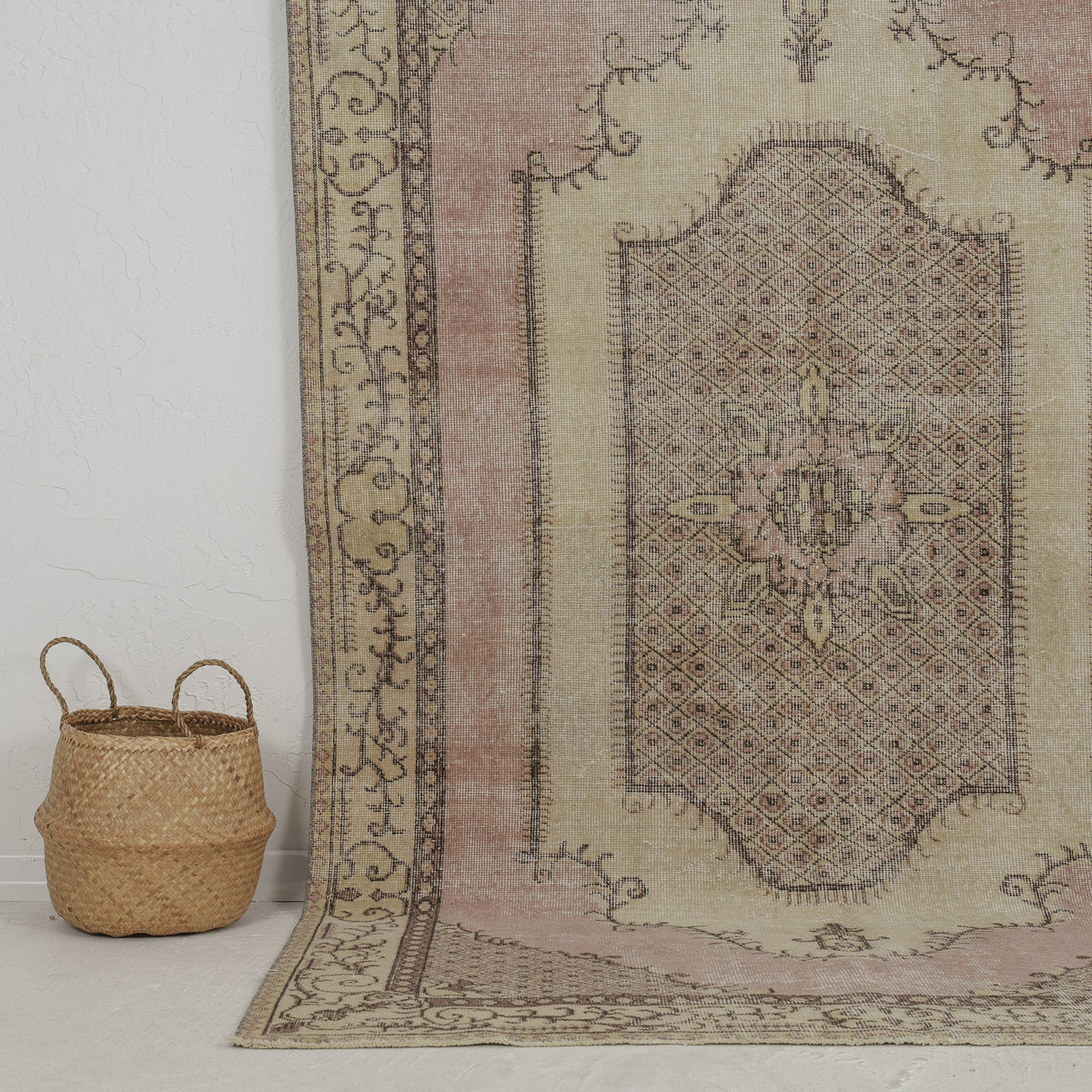 Authentic 5x9 area rug from turkish, in subtle pink tones