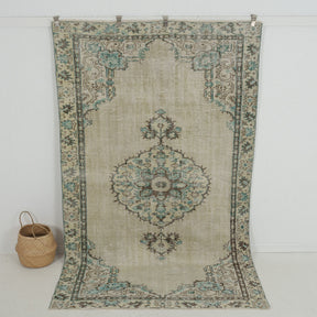 Handmade 5x9 area rug in beige, ideal for a cozy living room, bedroom, entryway, office, kitchen & dining