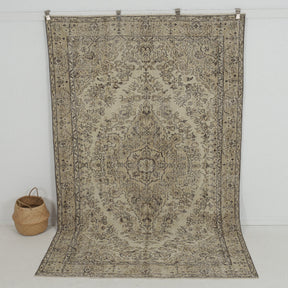 Handmade 6x9 area rug in beige, ideal for a cozy living room, bedroom, dining room, entryway, office