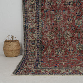 Authentic 7x10 area rug from turkish, in subtle red tones