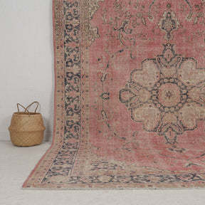 Authentic 7x10 area rug from turkish, in subtle pink tones