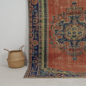 Authentic 6x9 area rug from turkish, in subtle orange tones