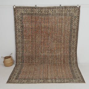 Handmade 7x10 area rug in orange, ideal for a cozy living room, bedroom, entryway, office, kitchen & dining