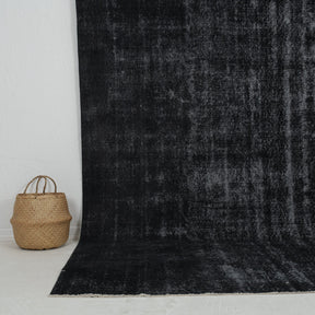 Authentic 7x10 area rug from turkish, in subtle black tones