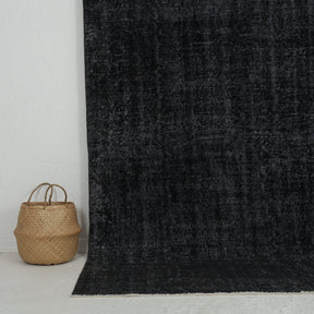 Authentic 7x9 area rug from turkish, in subtle black tones