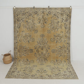 Handmade 7x10 area rug in gold, ideal for a cozy living room, bedroom, office, entryway, kitchen & dining