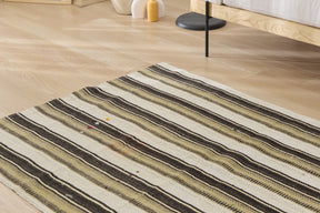 Yentel: An Enchanting Turkish Hemp Rug with a Rich Brown and Striped Design | Kuden Rugs